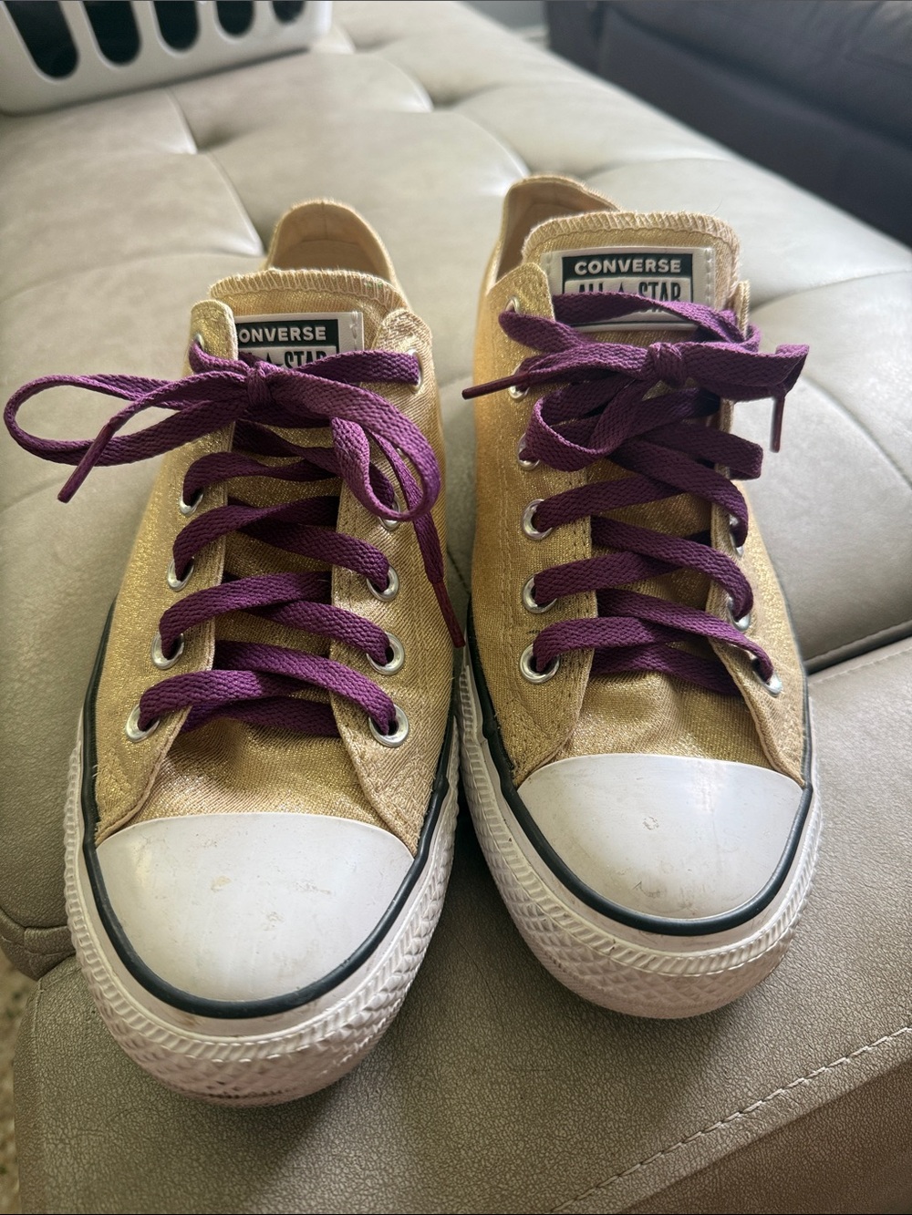 Converse Low Top Sneakers in Gold and Purple Laces